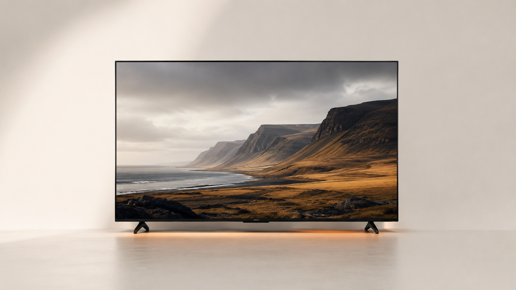 Large smart television displaying a mountain lake